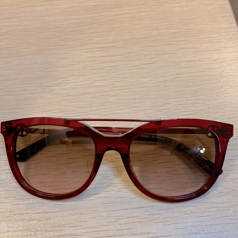 Tory Burch “Cranberry” sunglasses - New with case and dust bag.
